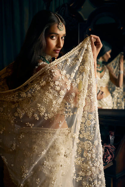Nora Fatehi in Ivory Three-dimensional Saree
